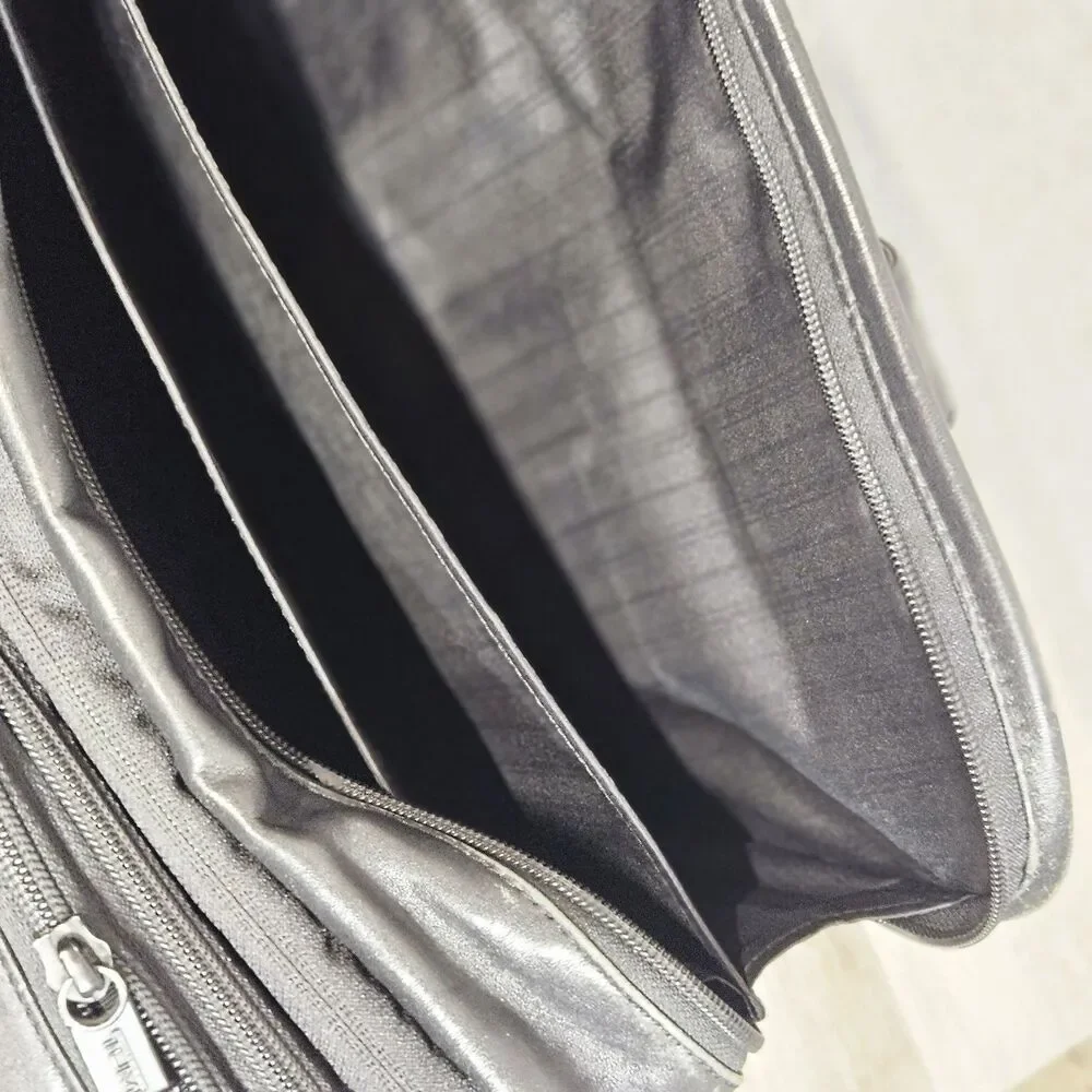 TUMI Black Leather Expandable Laptop Briefcase